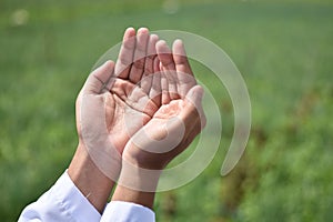 Hand of muslim people praying