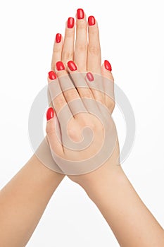 Hand with nail red manicure isolated on white background