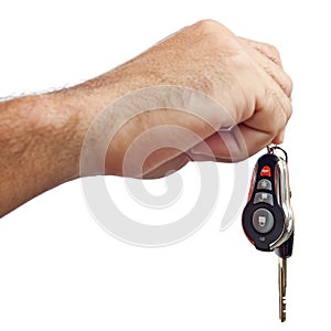 Hand with new car keys isolated on white