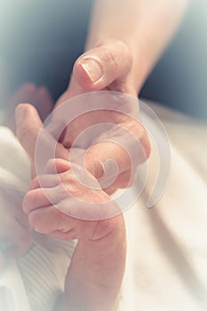 Hand of a newborn baby