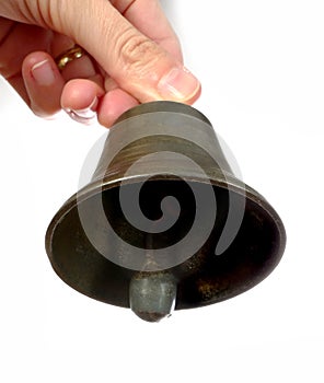 Hand with old bell