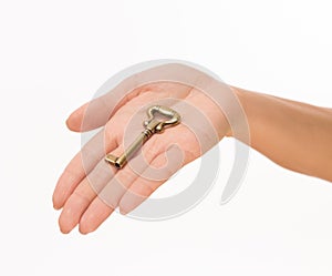 Hand with old key
