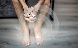 The hand of old man with the wrinkled hand and bruised, for healthy concept.