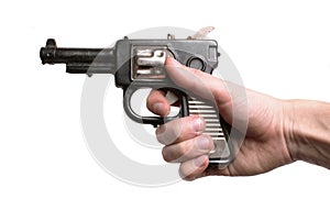 Hand with an old toy-gun