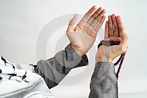 Hand open arm while pray in islamic culture