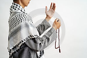 Hand open arm while pray in islamic culture