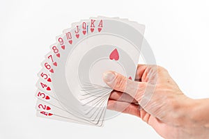 hand with open red cards in fan