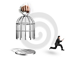 Hand opening cage with man using tablet and running