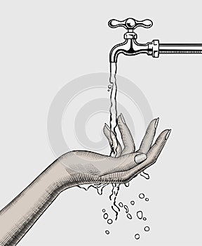 Hand opening water tap and woman washing hand