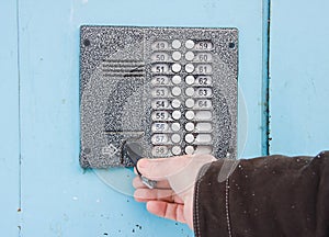 hand opens the key a door