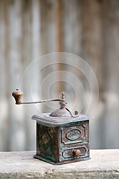Hand-operated old metallic coffee or spices grinder