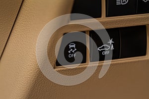 Hand operating ESP electronic stability program control close up view.