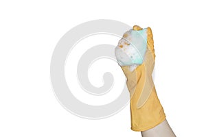 Hand in an orange rubber glove with an blue sponge and foam on a white background. Washing dishes, cleaning, home cleaning.