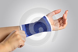 Hand with a orthopedic wrist brace