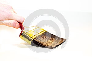 Hand with paintbrush