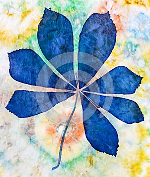 Hand painted blue chestnut leaf on silk batik photo