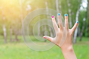 Hand with painted nails