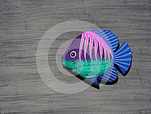 Hand-painted ornamental fish on a grey background
