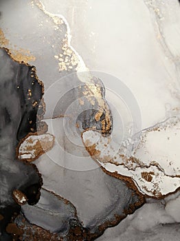 Luxury abstract fluid art painting background alcohol ink technique green and gold. Rough edges of paint flow out photo