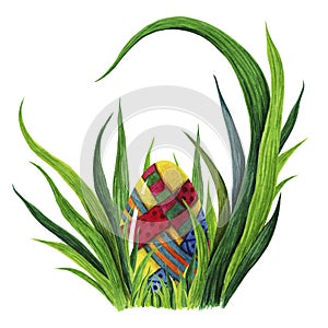 Hand painted watercolor illustration of colorful Easter egg whit decorative elements laying in fresh green grass tuffet