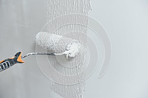 Hand painting wall in grey