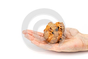 Hand palm showing fritter or oliebol