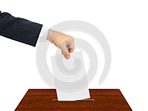 Hand with paper ballot