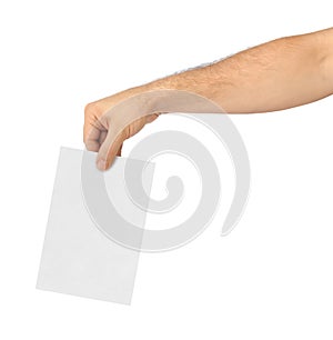 Hand with paper ballot