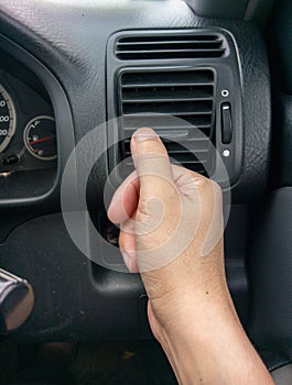 Hand on part of car automotive capture during transportation