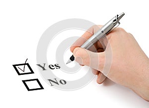 Hand with pen and check boxes