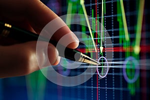 Hand and pen pointer, chart