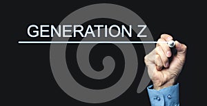 Hand with pen writing Generation Z in screen