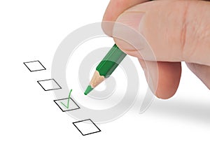 Hand with pencil and check boxes