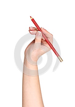 The hand with the pencil contour of the lips