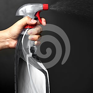 Hand, person or spray for cleaning studio on black background for domestic or housework chores. Press, mockup space or