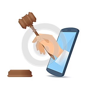 A hand through the phone`s screen holds a wooden gavel.