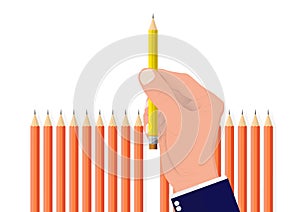 Hand picking one different pencil from the others, business concept of planning choosing the right target and resource