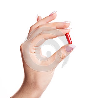 Hand with a pill