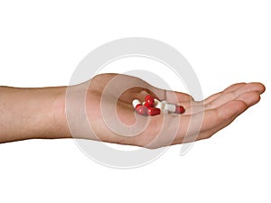 Hand with pills photo