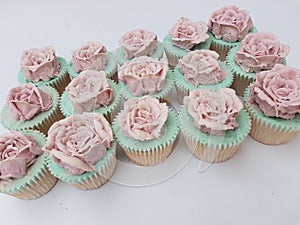 Hand piped buttercream vintage rose cupcakes photo