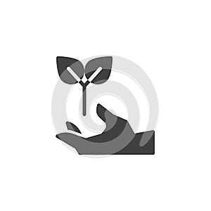 Hand with plant vector icon