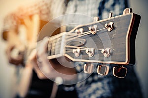 Hand play guitar. photo