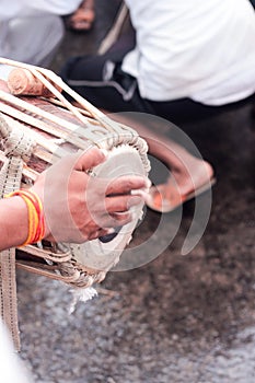 hand playing an classical Indian percussion musical instrument