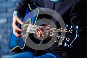 Hand playing folk guitar action design