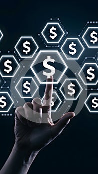 Hand pointing at digital interface with dollar sign hexagons, futuristic ambiance