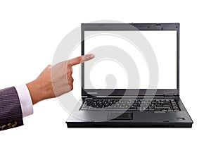 Hand pointing to a laptop