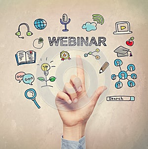 Hand pointing to Webinar concept