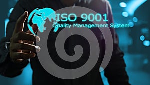 Hand pointing to the world image and ISO9001 quality management system