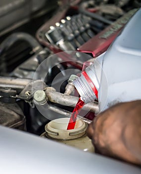 Hand pouring transmission fluid