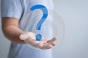 Hand present question mark